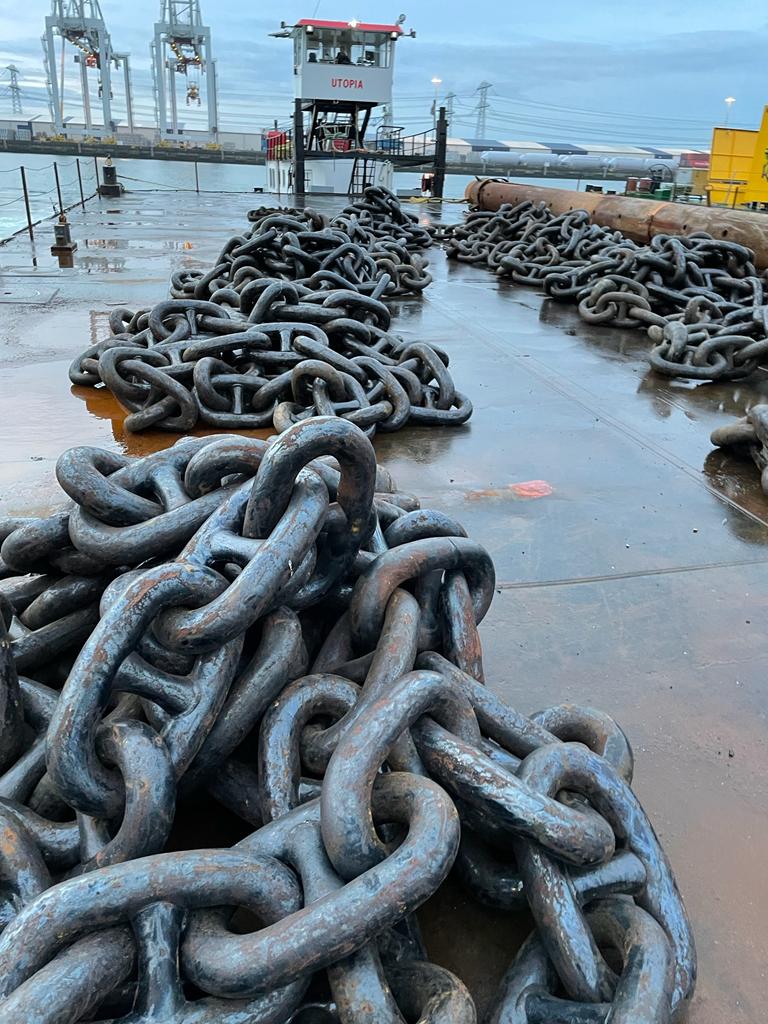 Stud link anchor chain ready for installation on barge